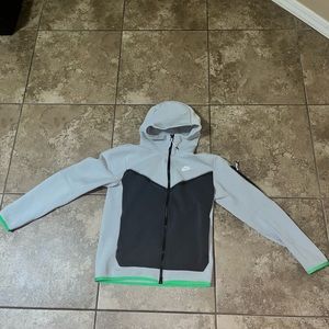 Grey and black Nike Tec